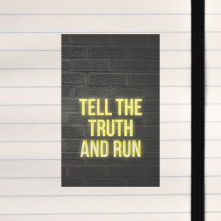 Bright yellow text glows on a dark brick wall, delivering a punchy message.
