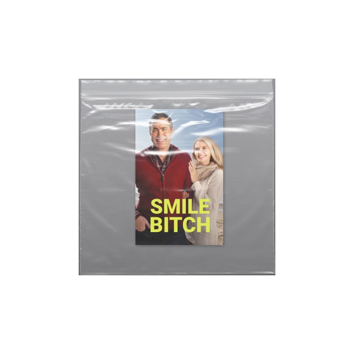 A cheerful beach photo of a couple is overlaid with bold, abrasive text, creating a jarring contrast between the warm scene and