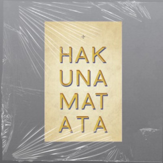 A clean, vertical typographic layout presents the phrase “Hakuna Matata” in bold gold lettering against a textured neutral backg