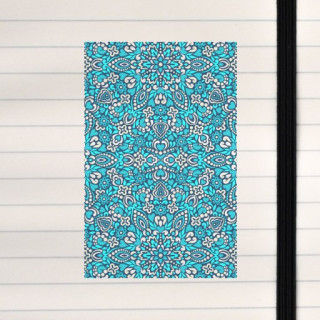 A symmetrical mandala-style pattern built from layered floral and paisley shapes in cool blue and turquoise tones.