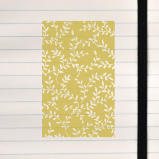 A flowing white vine pattern set against a warm mustard background.