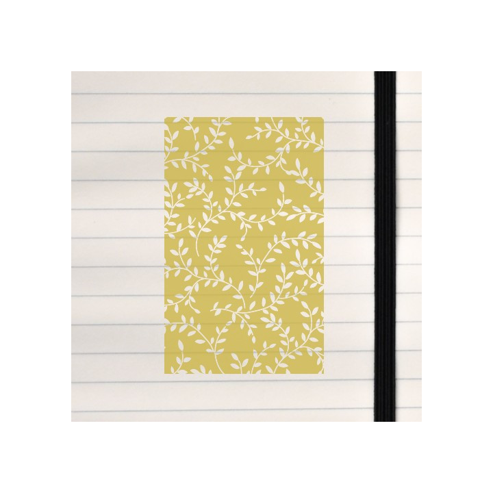 A flowing white vine pattern set against a warm mustard background.
