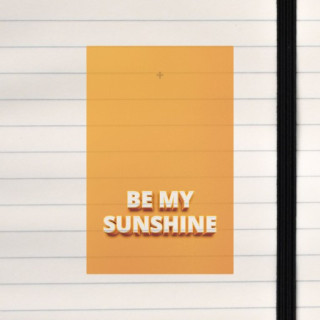 A cheerful orange canvas beams with the playful message “BE MY SUNSHINE” in bold 3D text.
