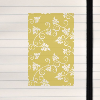 A classic white vine motif flowing across a warm mustard background.