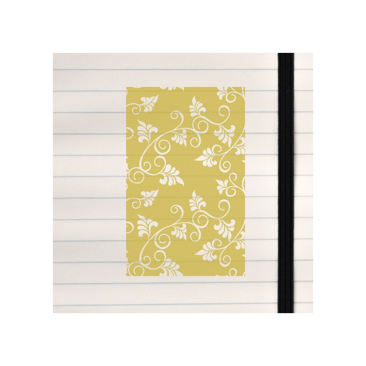 A classic white vine motif flowing across a warm mustard background.