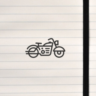 A streamlined motorcycle emblem built from bold geometric lines and pure motion.