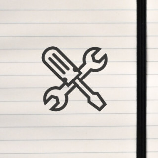 A clean, crossed‑tools emblem built from bold geometric strokes for fast, universal readability.