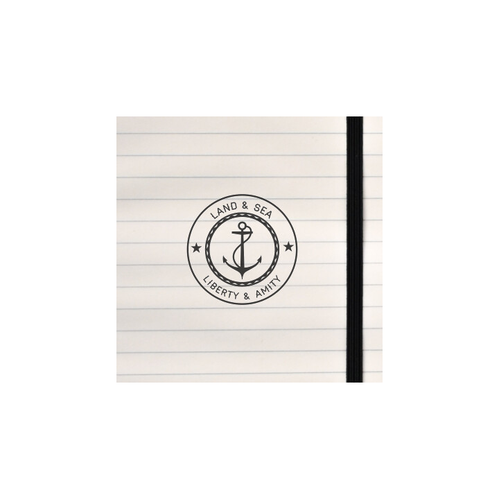 A bold nautical crest featuring an anchor, rope‑ring, and classic maritime lettering.