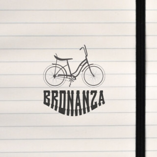 A bold western‑style logo featuring a classic bicycle silhouette.