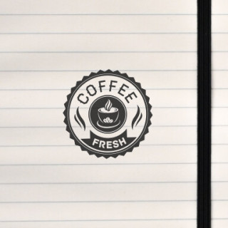 A bold circular badge featuring a steaming cup and “COFFEE • FRESH” text.