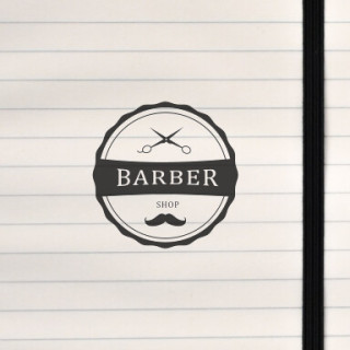 A vintage circular badge with scissors, mustache, and bold lettering.