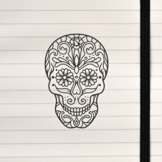 A decorative skull filled with symmetrical floral and ornamental patterns.
