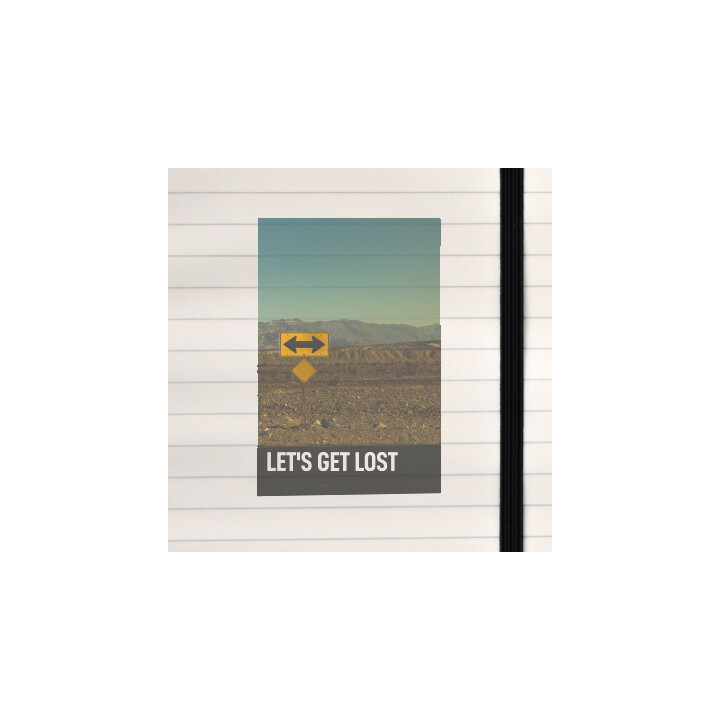 A playful desert‑road sign inviting adventure and open‑ended wandering.