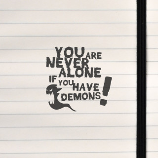 A bold, gritty statement paired with a snarling shadow‑creature.