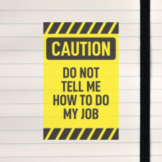 A bold warning sign rejecting unsolicited advice.