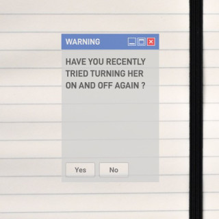 A playful tech‑style Windows XP-like warning window delivers a cheeky troubleshooting joke with classic “Yes/No” buttons.