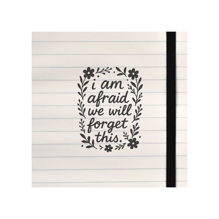 A delicate black‑and‑white floral frame surrounds a handwritten phrase creating a quiet, nostalgic mood.