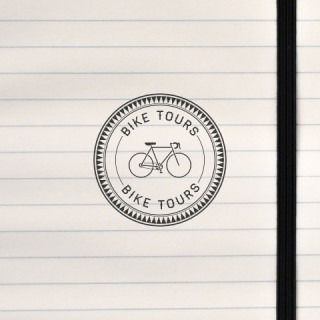A circular badge for bike tours.