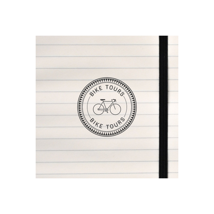 A circular badge for bike tours.